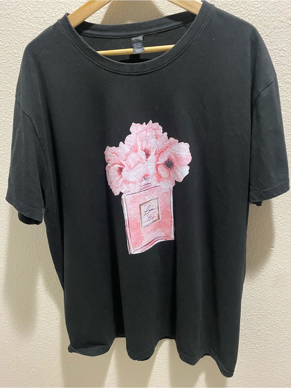 📚✏️Back to School vibes Black Floral Perfume Graphic Tee by